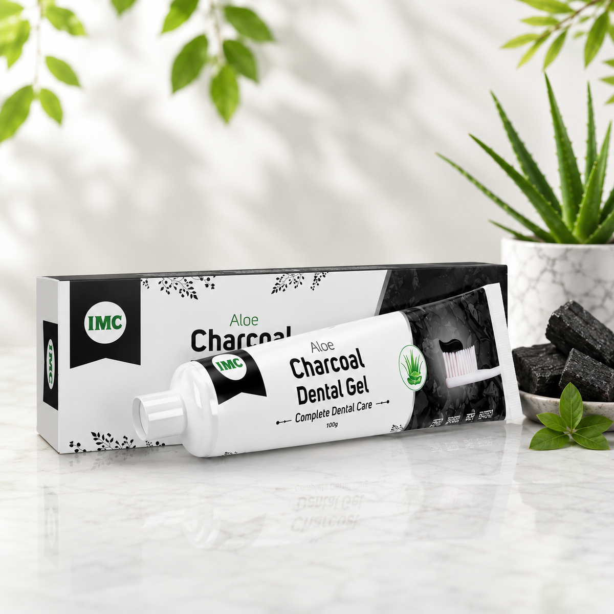IMC Aloe Charcoal Dental Paste tube with aloe and charcoal elements for oral hygiene and gum health